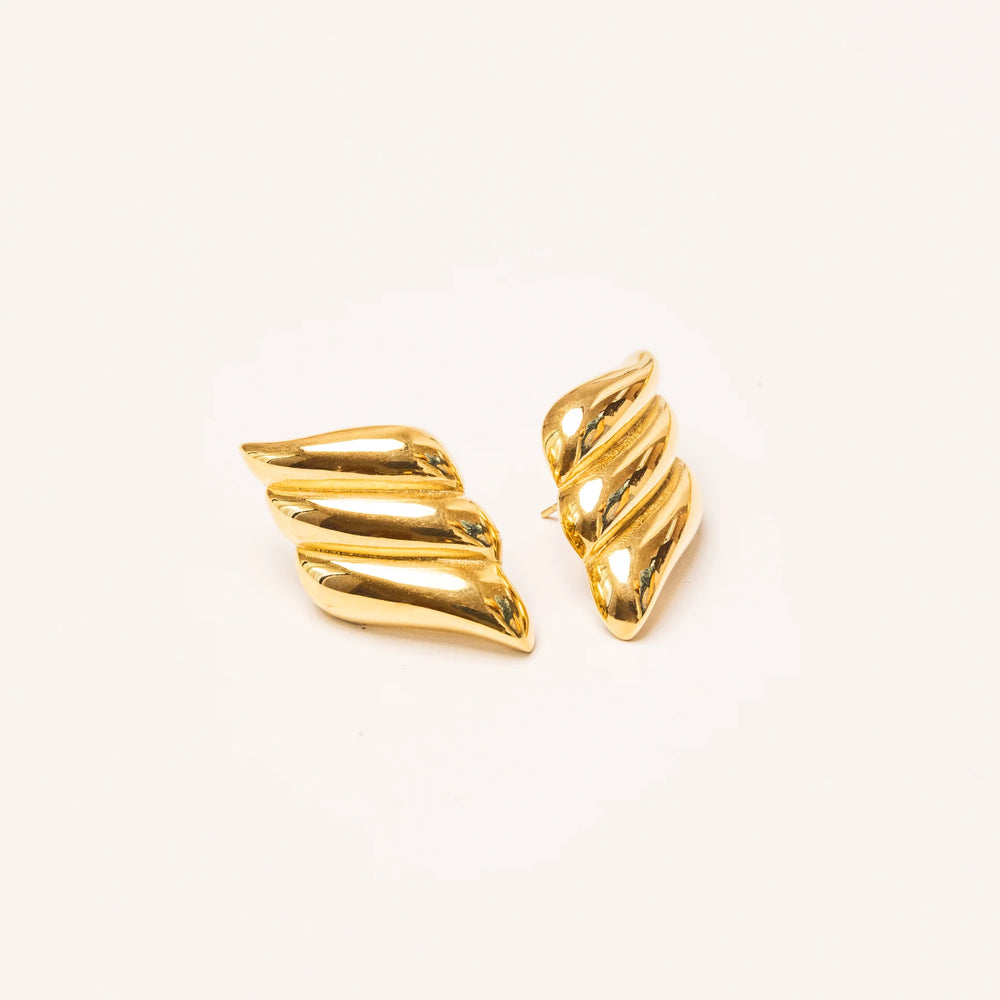 
                      
                        We Are Emte- Croissant Studs in Gold
                      
                    