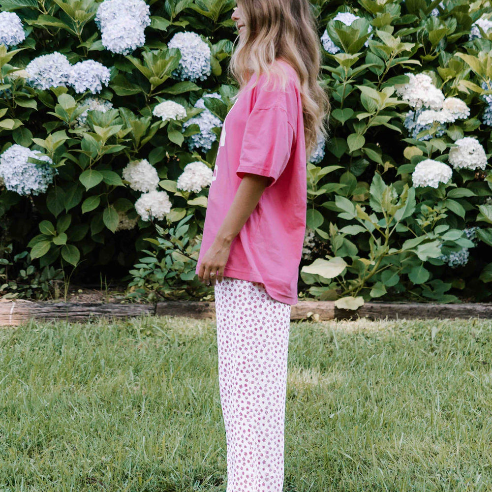 
                      
                        häll störe - The Fleur Tee in Lolly + White
                      
                    