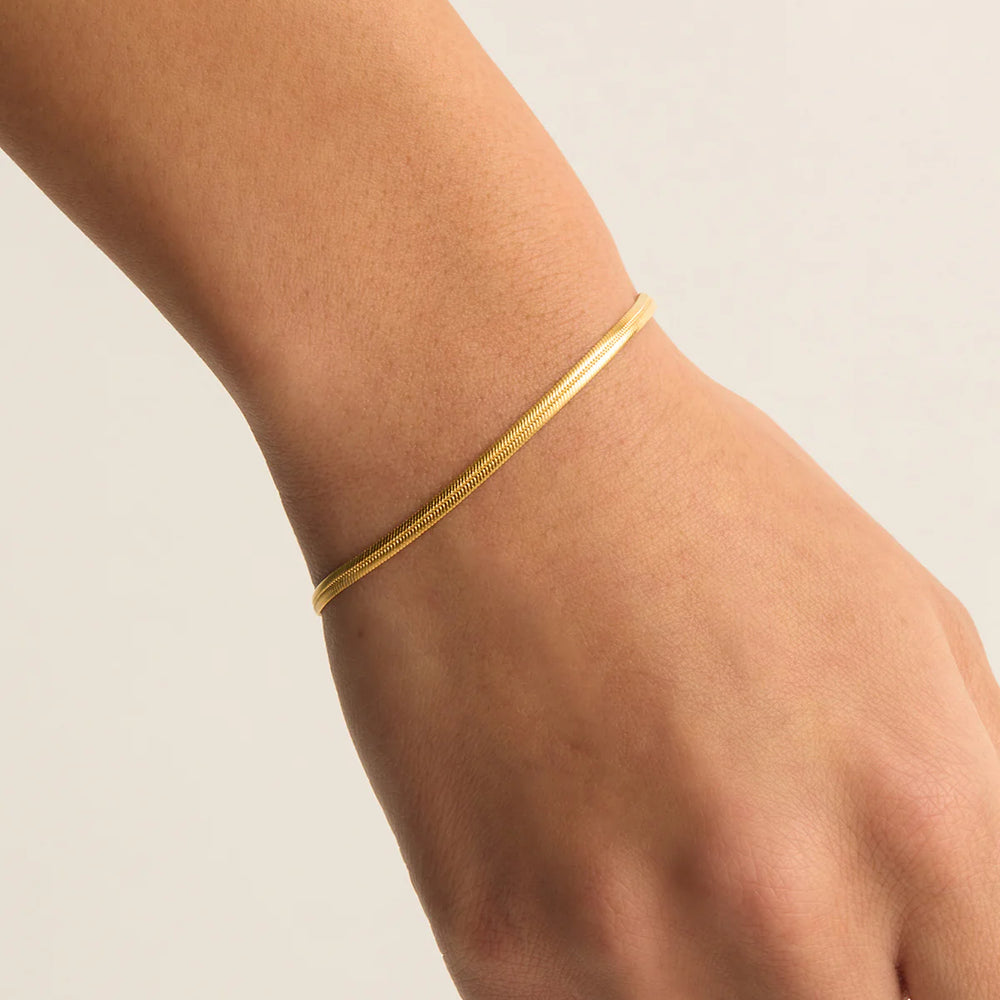 
                      
                        By Charlotte - Herringbone Chain Bracelet in Gold
                      
                    